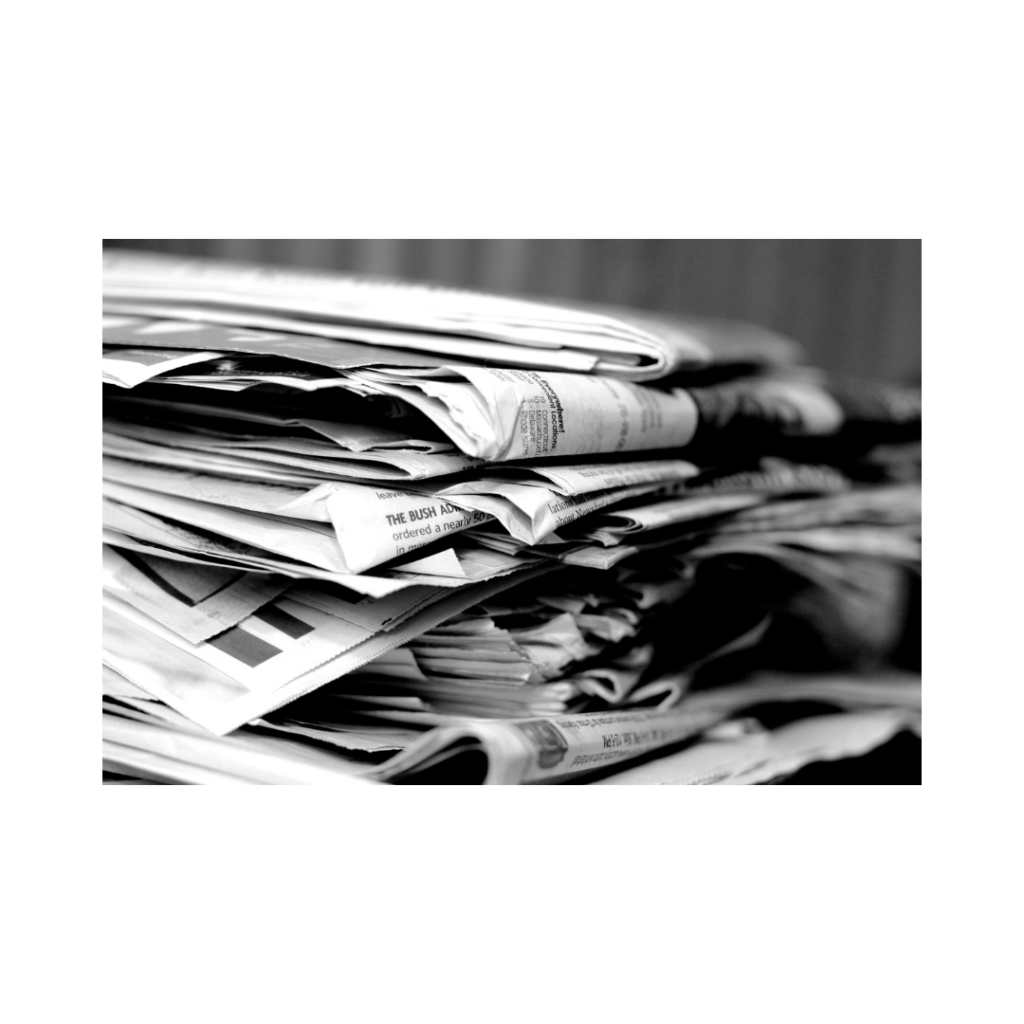 Newspapers and Pop-ups - a pile of newspapers