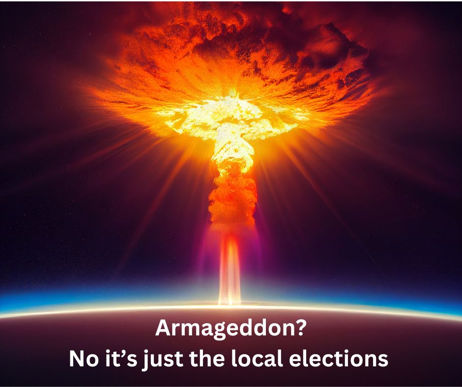 A nuclear explosions orange mushroom cloud above the world with the words Armageddon? No It's just the local elections