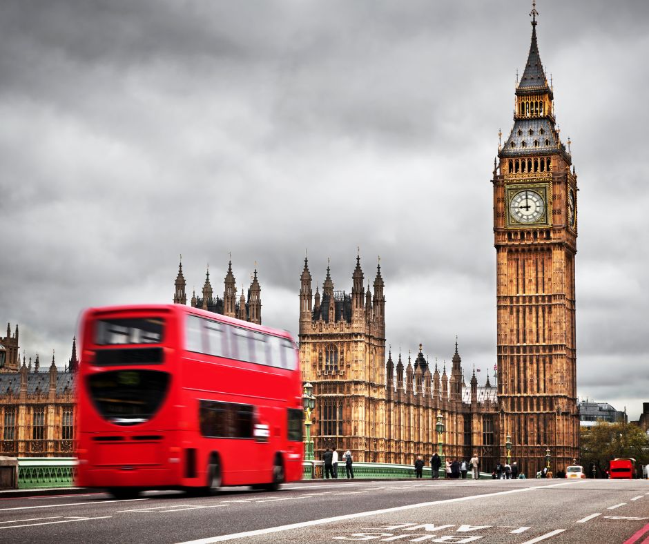 Armageddon - Houses of Parliament with Elizabeth Tower housing Big Ben stops at 9 o clock - a red double decker bus is int he foreground